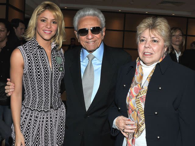 <p>Pascal Le Segretain/Getty</p> Shakira with her parents after being honored by French culture Ministerat Hotel Majestic in January 2012 in Cannes, France.