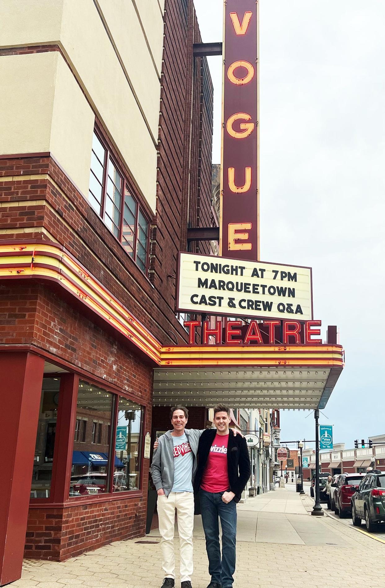 Filmmakers Joseph Beyer, left, and Jordan Anderson outside the Vogue Theatre in Manistee for a screening of their documentary "Marqueetown."