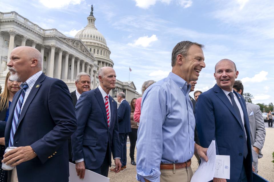 Rep. Chip Roy, R-Texas, left, Sen. Rick Scott, R-Fla., Rep. Scott Perry, R-Pa., and Rep. Mike Lee, R-Utah, right, join lawmakers from the conservative House Freedom Caucus, the conservatives who are challenging Speaker McCarthy on the government funding bill, for a news conference outside the Capitol in Washington, Tuesday, Sept. 12, 2023.(AP Photo/Jacquelyn Martin) | Jacquelyn Martin, Associated Press