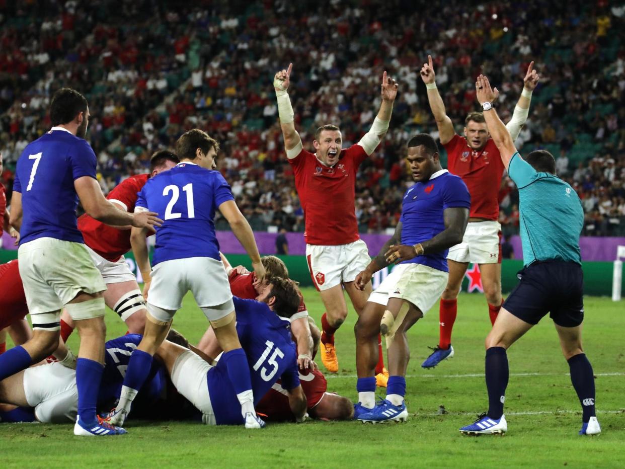 Wales celebrate as Ross Moriarty scores their crucial try: AP