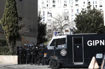 French GIPN police intervention forces are seen during an operation to secure the Castellane housing area in Marseille, February 9, 2015. REUTERS/Philippe Laurenson