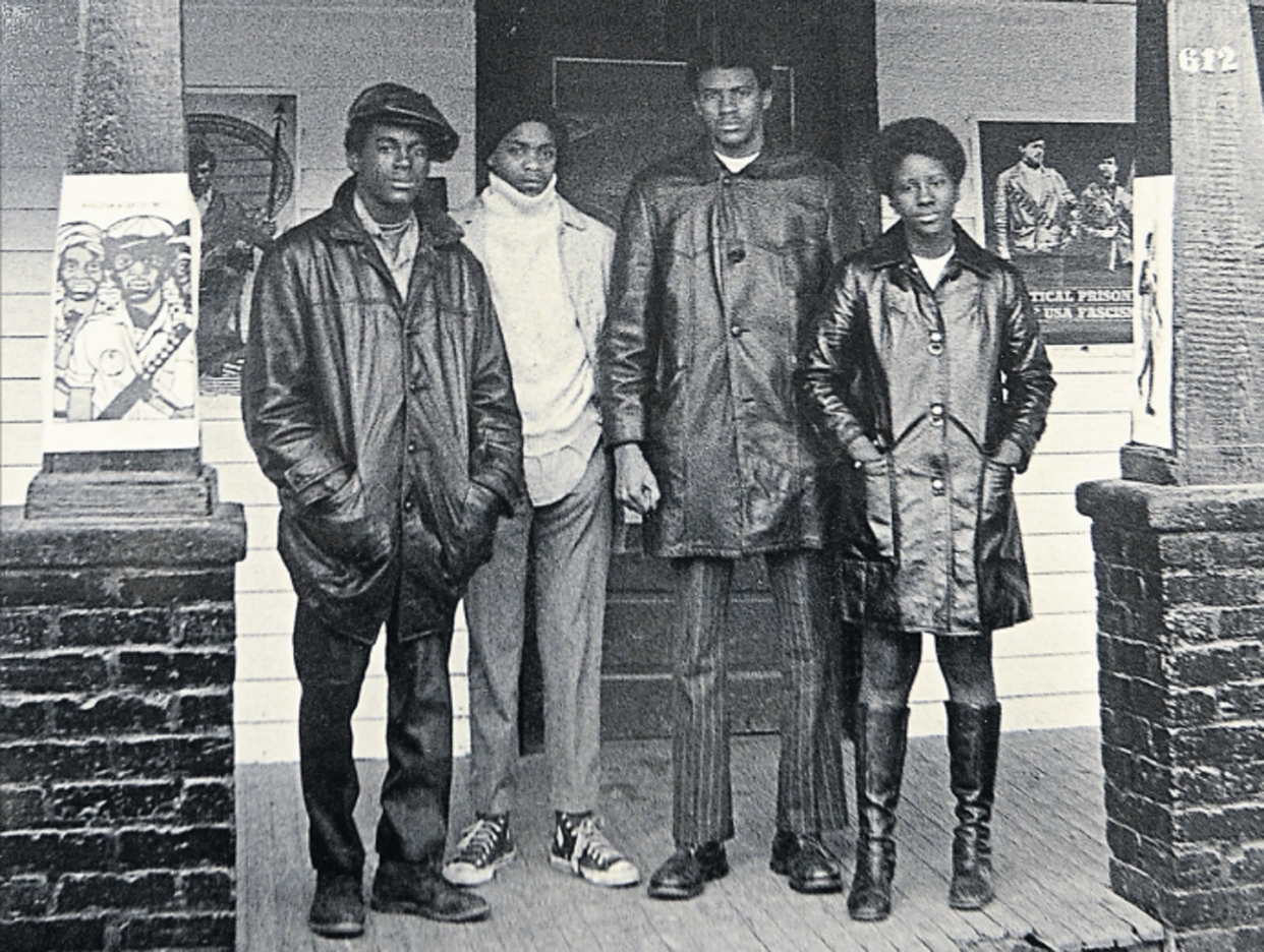 <span class="caption">Members of the Black Panther Party outside the High Point property raided by police</span> <span class="attribution"><a class="link " href="https://www.hpenews.com/" rel="nofollow noopener" target="_blank" data-ylk="slk:Sonny Hedgecock/High Point Enterprise;elm:context_link;itc:0;sec:content-canvas">Sonny Hedgecock/High Point Enterprise</a>, <a class="link " href="http://creativecommons.org/licenses/by-sa/4.0/" rel="nofollow noopener" target="_blank" data-ylk="slk:CC BY-SA;elm:context_link;itc:0;sec:content-canvas">CC BY-SA</a></span>