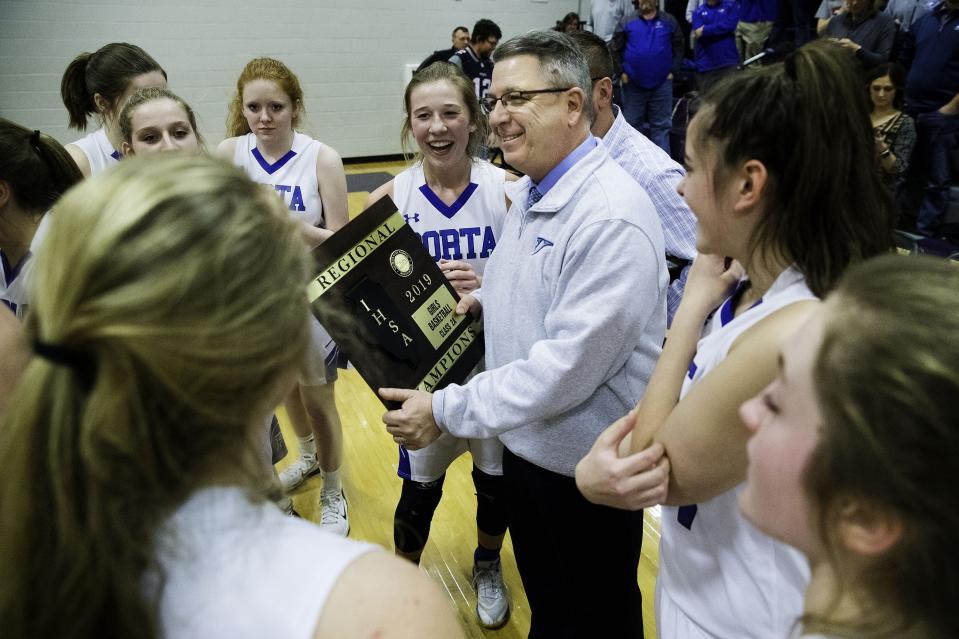 PORTA head coach Eric Kesler smiles as he holds the regional championship plaque after the Blue Jays defeated Williamsville during the 2A Williamsville Regional at Williamsville High School Thursday, February 7, 2019. [Ted Schurter/The State Journal-Register]