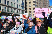 <p>Demonstrators hold up signs and chant anti-Trump slogans at the “Not My President’s Day” rally at Central Park West in New York City on Feb. 20, 2017. (Gordon Donovan/Yahoo News) </p>