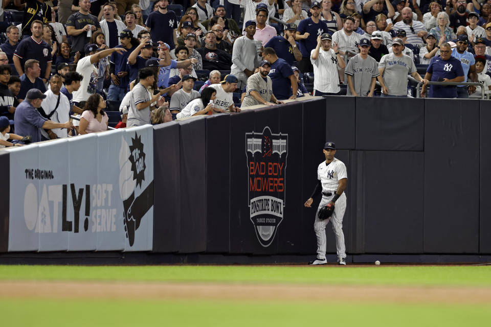 New York Yankees left fielder Aaron Hicks reacts after missing a catch on a RBI double hit by Tampa Bay Rays' Wander Franco during the fourth inning of a baseball game Friday, Sept. 9, 2022, in New York. (AP Photo/Adam Hunger)