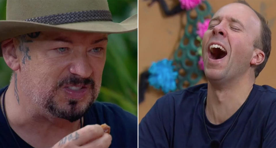 Boy George and Matt Hancock sit down for a tense dinner in I'm A Celebrity. (ITV)