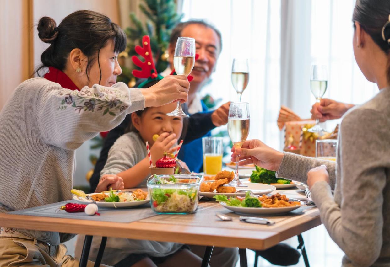 Whether to be harsher or more lax, drinking can affect parenting. <a href="https://www.gettyimages.com/detail/photo/multi-generation-family-eating-christmas-dinner-royalty-free-image/852031996" rel="nofollow noopener" target="_blank" data-ylk="slk:JGalione/E+ via Getty Images;elm:context_link;itc:0;sec:content-canvas" class="link ">JGalione/E+ via Getty Images</a>