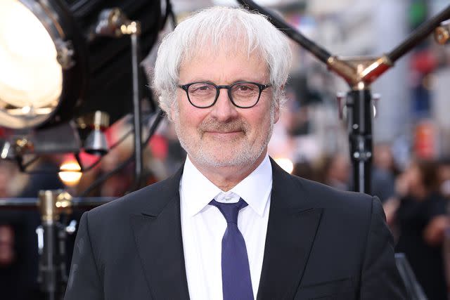 <p>Tim P. Whitby/Getty</p> Simon Curtis attends the world premiere of "Downton Abbey: A New Era" on April 25, 2022 in London, England.