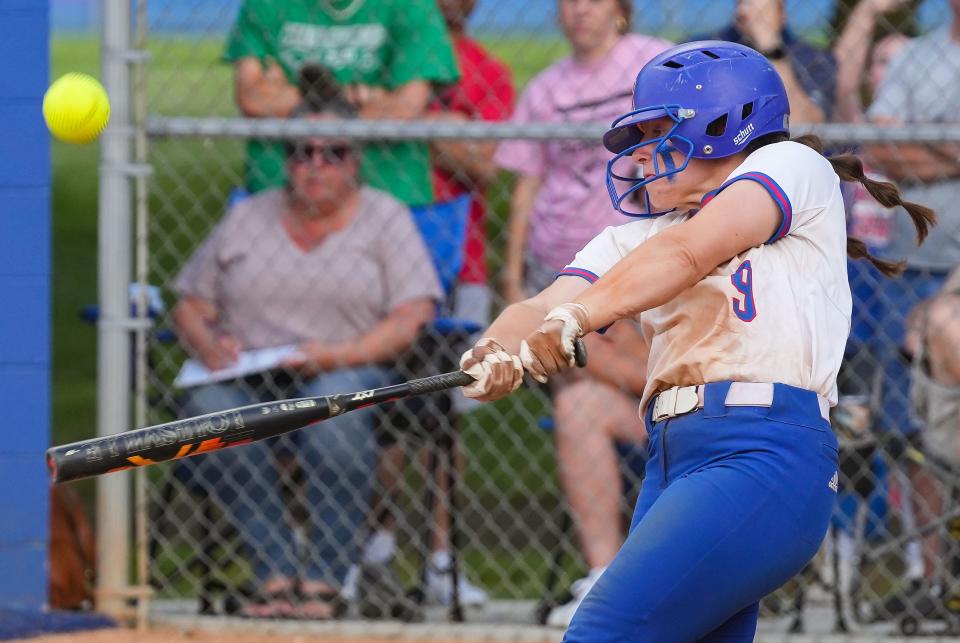 Roncalli Royals Abbey Hofmann (9) hits the ball during the IHSAA class 4A regional championship on Tuesday, May 30, 2023, at Roncalli High School in Indianapolis. The Roncalli Royals defeated the Avon Orioles, 9-1. 