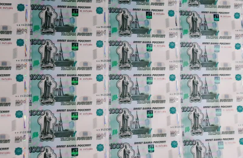 FILE PHOTO: A sheet of 1000 Russian Rouble notes at Goznak printing factory in Moscow