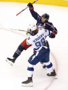 Columbus Blue Jackets right wing Cam Atkinson (13) gets bumped by Tampa Bay Lightning defenseman Mikhail Sergachev (98) as he celebrates his goal during the second period in Game 4 of an NHL hockey first-round playoff series in Toronto on Monday, Aug. 17, 2020. (Frank Gunn/The Canadian Press via AP)