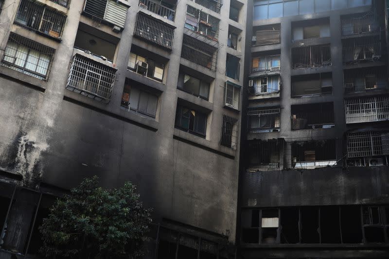 Damaged residential building after a fire is pictured in Kaohsiung