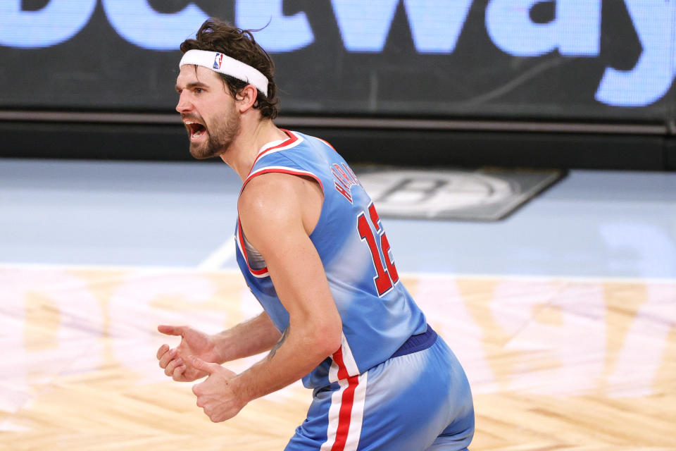 NEW YORK, NEW YORK - JANUARY 12: Joe Harris #12 of the Brooklyn Nets reacts after scoring during the second half against the Denver Nuggets at Barclays Center on January 12, 2021 in the Brooklyn borough of New York City. The Nets won 122-116. NOTE TO USER: User expressly acknowledges and agrees that, by downloading and or using this Photograph, user is consenting to the terms and conditions of the Getty Images License Agreement. 