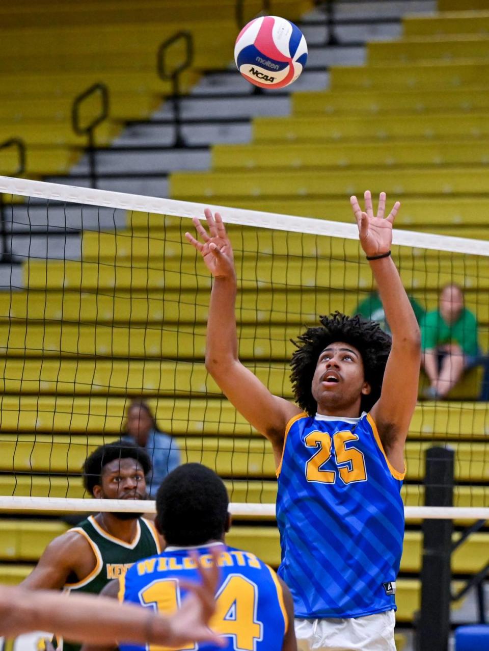 Fort Valley State’s Justin Yates (25) sets the ball during the Wildcats three set win over Kentucky State Thursday during the first round of the SIAC conference tournament.