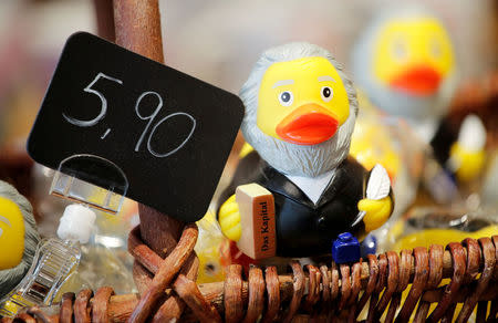 FILE PHOTO: A rubber duck depicting German philosopher Karl Marx is for sale at the price of 5.90 euro (about 7.30 U.S. dollars) at a souvenir shop in his hometown in Trier, Germany, April 13, 2018. REUTERS/Wolfgang Rattay/File Photo