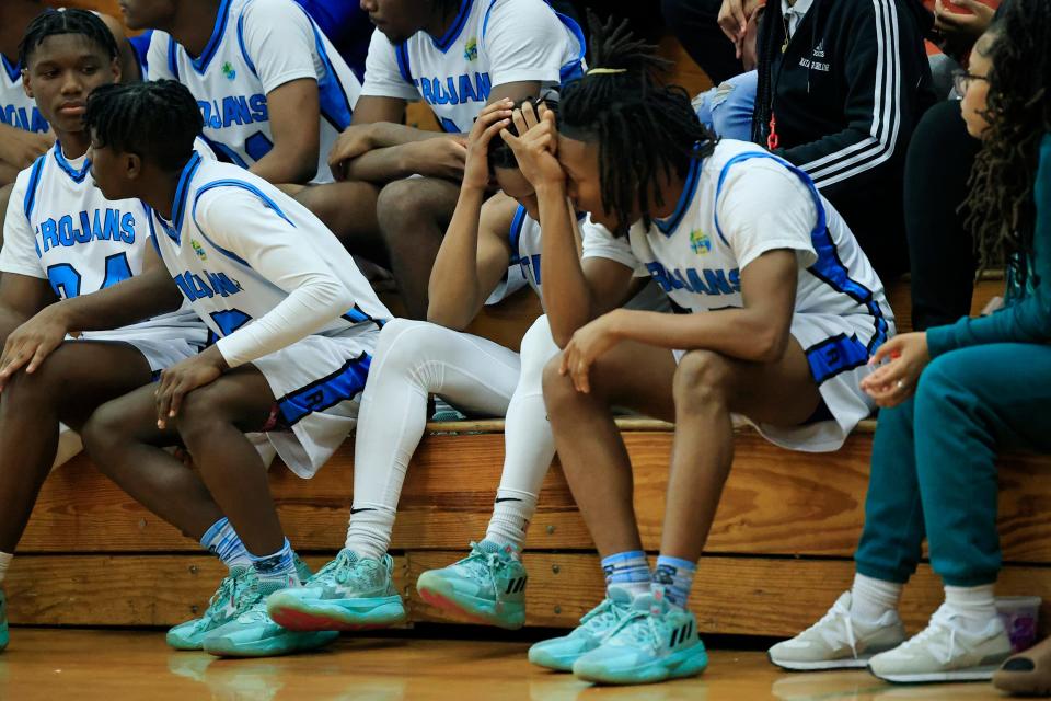 Ribault's Caleb Williams (3) reacts to fouling out during overtime of the 2022-2023 Gateway Conference boys high school basketball tournament final Friday, Jan. 27, 2023 at Jean Ribault High School in Jacksonville, Fla. The Ribault Trojans defeated the Andrew Jackson Tigers 60-55 in overtime. 