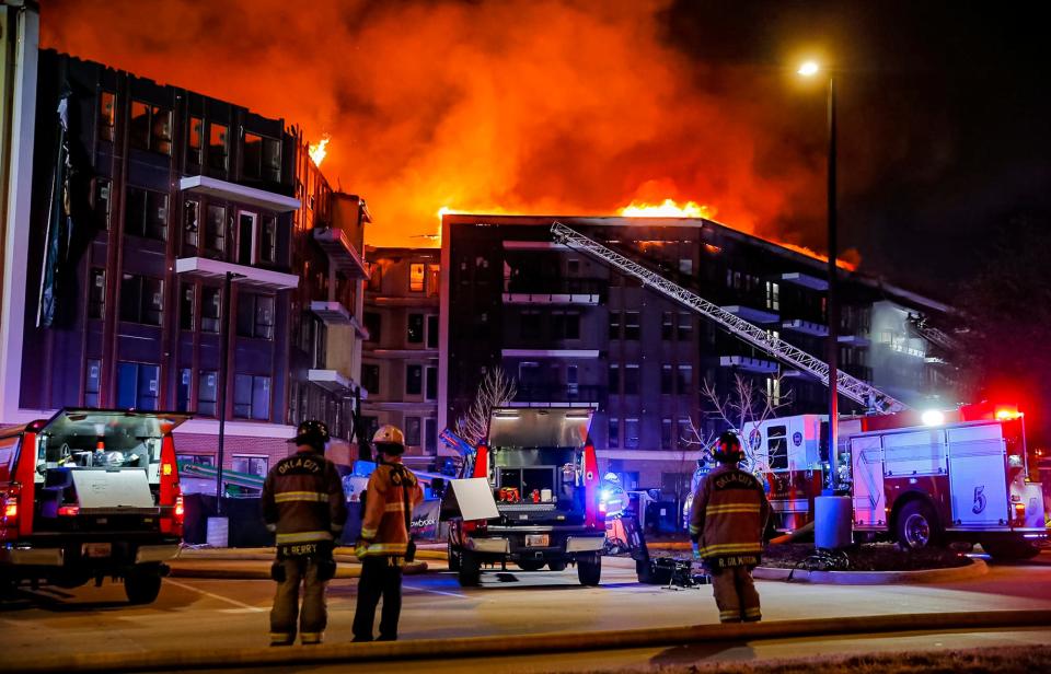 Fire crews battle a fire at The Canton apartment complex located 6161 N. Western Ave. in Oklahoma City, Tuesday, Feb. 8, 2022.