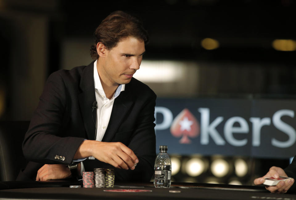 Nadal ligó en el 2012 su imagen a la página web PokerStars siguiendo los pasos de otros tenistas como Boris Becker o Gael Monflis.(AP Photo/Lefteris Pitarakis)