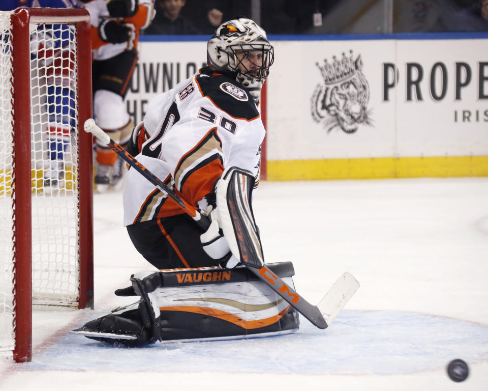 Anaheim Ducks goaltender Ryan Miller (30) deflects a shot during the second period of an NHL hockey game against the New York Rangers, Sunday, Dec. 22, 2019, in New York. (AP Photo/Kathy Willens)