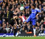 Chelsea's Ivorian striker Didier Drogba (R) vies with Barcelona's Spanish midfielder Sergio Busquets (L) during their UEFA Champions League semi-final first leg football football match at Stamford Bridge in London, England. Chelsea won 1-0