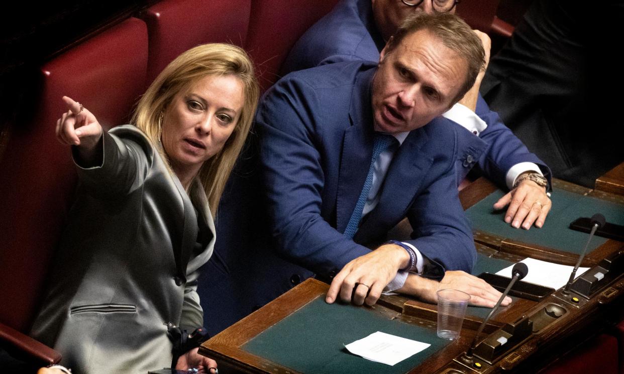 <span>Giorgia Meloni and Francesco Lollobrigida in October 2022. Lollobrigida, the agriculture minister who is suing a philosopher, is married to Meloni’s sister.</span><span>Photograph: Alessandra Benedetti/Corbis/Getty Images</span>