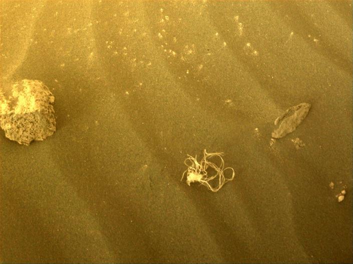 On July 12, Perseverance spotted a tangled mess that is likely debris left over from its arrival on Mars.