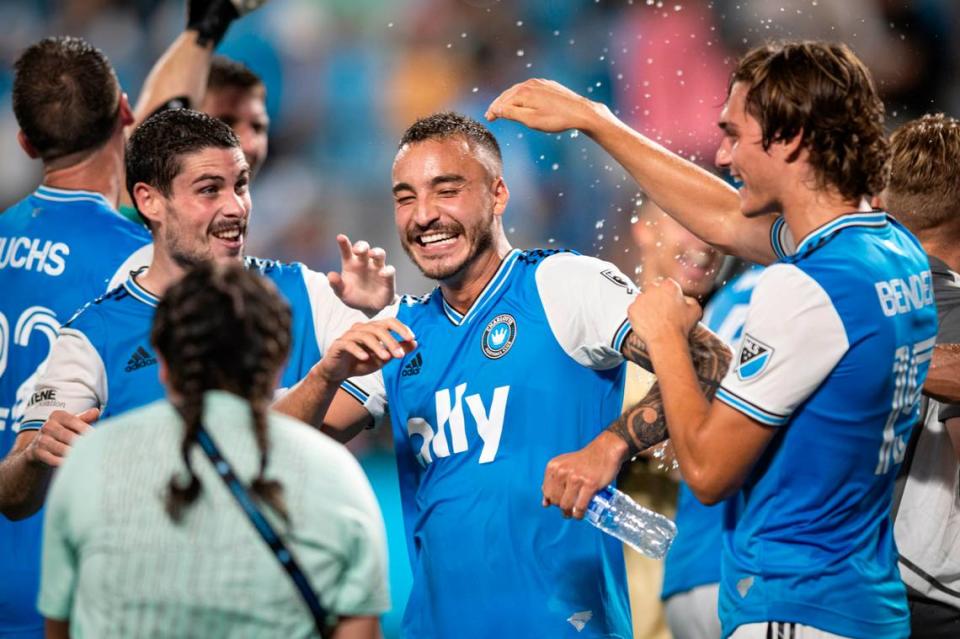 Charlotte FCís Sergio Ruiz (6), Andre Shinyashiki (16), and Benjamin Bender (15) celebrate after a 4-1 victory against Nashville SC at Bank of America Stadium in Charlotte, N.C. on Saturday, July 9, 2022. Arthur H. Trickett-Wile/atrickett-wile@charlotteobserver