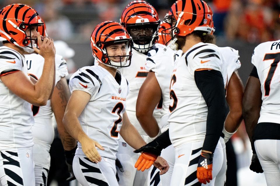 Aug 12, 2022; Cincinnati, Ohio, USA; Cincinnati Bengals place kicker Evan McPherson (2) smiles after hitting a 58-yard field goal in the first half of the NFL preseason game between the Cincinnati Bengals and the Arizona Cardinals at Paycor Stadium. Mandatory Credit: Albert Cesare-USA TODAY Sports