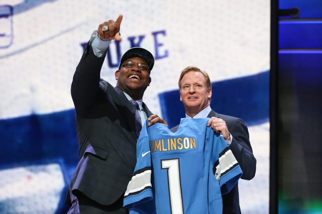 Laken Tomlinson of the Duke Blue Devils holds up a jersey with NFL Commissioner Roger Goodell after being picked #28 overall by the Detroit Lions during the first round of the 2015 NFL Draft at the Auditorium Theatre of Roosevelt University on April 30, 2015 in Chicago, Illinois. (Photo by Jonathan Daniel/Getty Images)