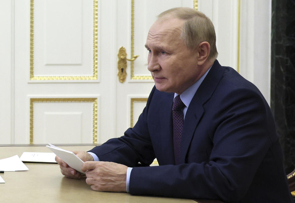 Russian President Vladimir Putin chairs a meeting on economic issues via teleconference call in Moscow, Russia, Monday, Sept. 12, 2022. (Gavriil Grigorov, Sputnik, Kremlin Pool Photo via AP)