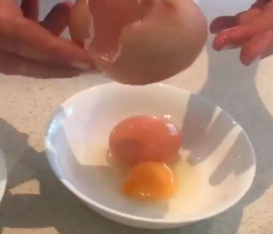 Runnymede farm posted a video of the giant egg being cracked into a bowl. Source: Runnymede Farm/Facebook