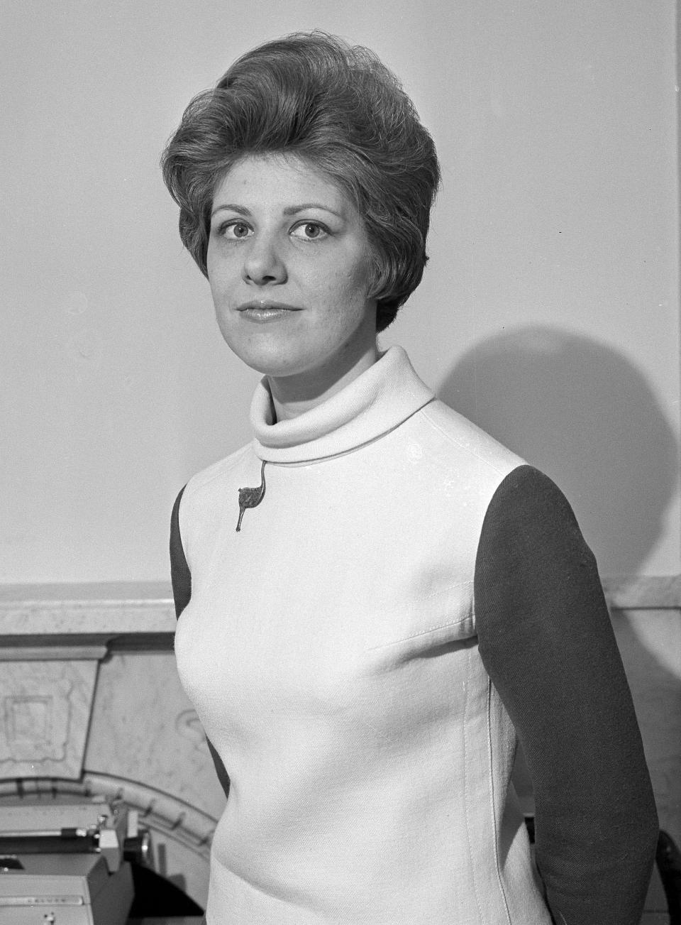 FILE - Associated Press staff writer Peggy Simpson is shown in Washington, March 16, 1968. Simpson, a former Associated Press reporter, is among the last surviving witnesses to the events surrounding the assassination of Kennedy are among those sharing their stories as the nation marks the 60th anniversary. (AP Photo, File)