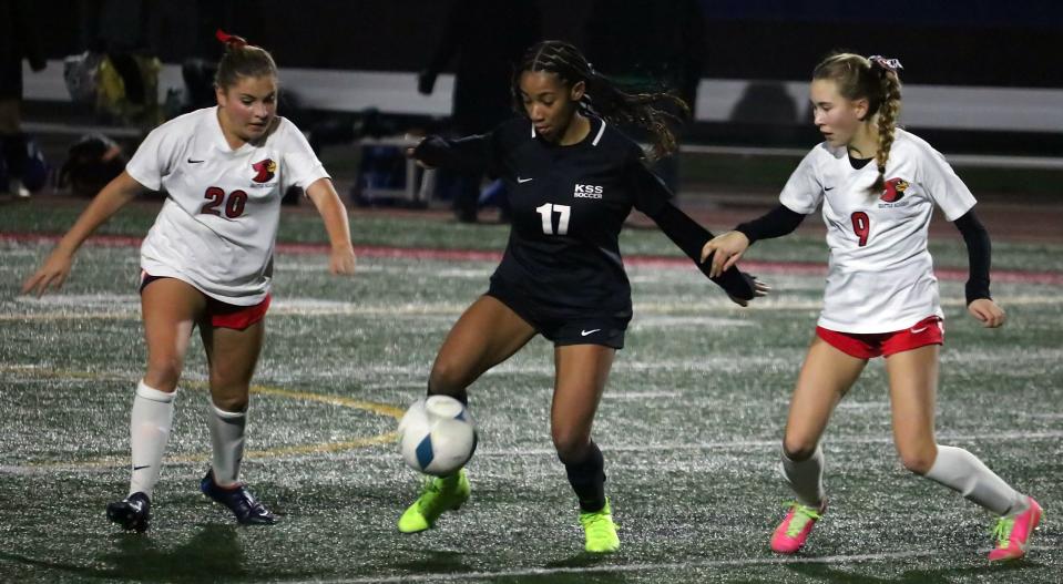 Klahowya's Amira Lyons is defended by a pair of Seattle Academy players during Saturday's Class 1A state title game at Mount Tahoma High School. Seattle Academy prevailed 2-1.