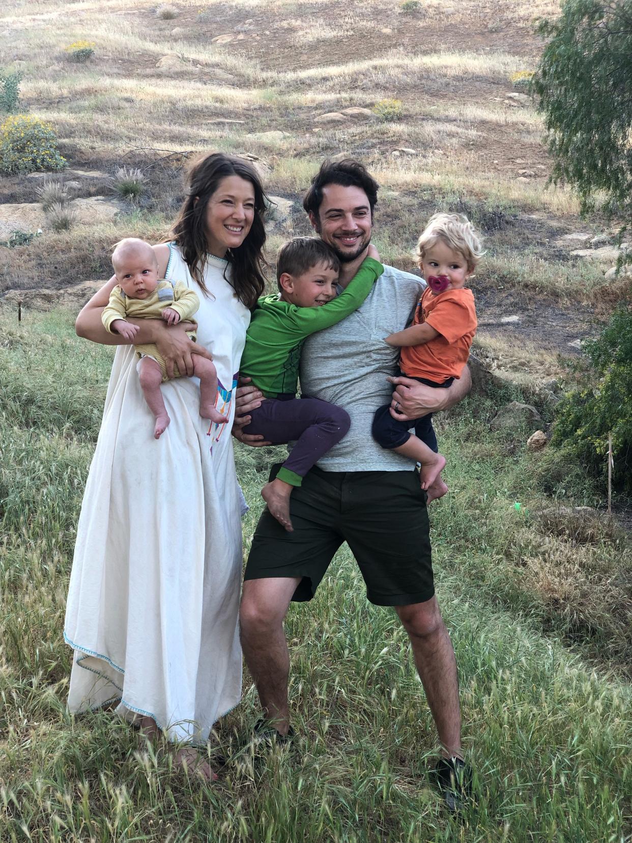 Sarah and Brandon Gullotti and their three kids near their home in Riverside, Calif. The couple used startup Flyhomes to get into their starter home last year.