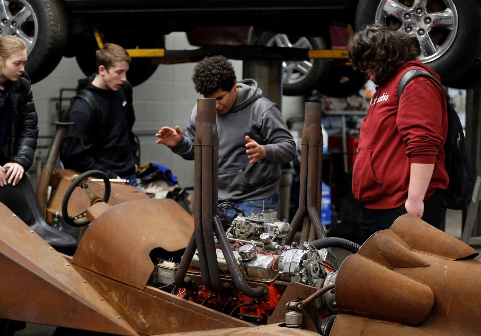 Lincoln Golden Eagle Industries students work in the auto shop Feb. 24, 2022.