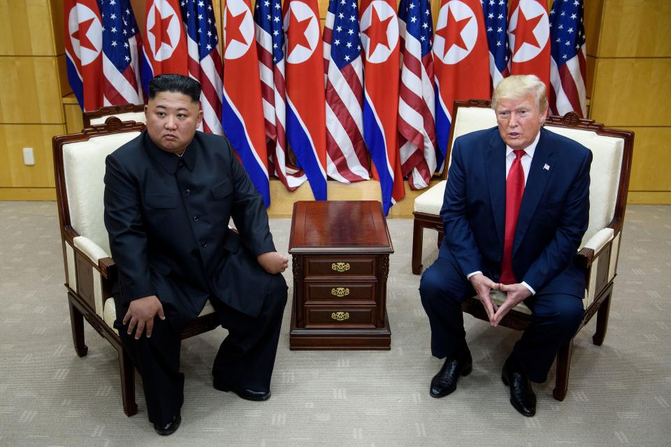 North Korea's leader Kim Jong Un (L) and US President Donald Trump meet on the south side of the Military Demarcation Line that divides North and South Korea, in the Joint Security Area (JSA) of Panmunjom in the Demilitarized zone (DMZ) on June 30, 2019. (Photo by Brendan Smialowski / AFP)        (Photo credit should read BRENDAN SMIALOWSKI/AFP/Getty Images)