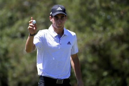 Apr 22, 2018; San Antonio, TX, USA; Joaquin Niemann reacts after making a birdie putt on the sixth green during the final round of the Valero Texas Open golf tournament at TPC San Antonio - AT&T Oaks Course. Mandatory Credit: Soobum Im-USA TODAY Sports