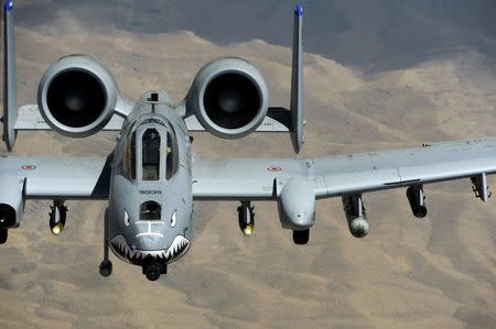 A U.S. Air Force A-10 Thunderbolt aircraft from Bagram Air Base flies a combat mission over Afghanistan, in this handout photograph taken on June 14, 2009. REUTERS/Staff Sgt. Jason Robertson/U.S. Air Force/Handout via Reuters