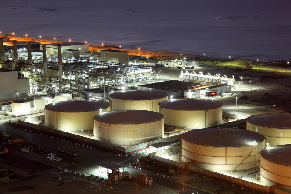 A marine storage terminal at night.