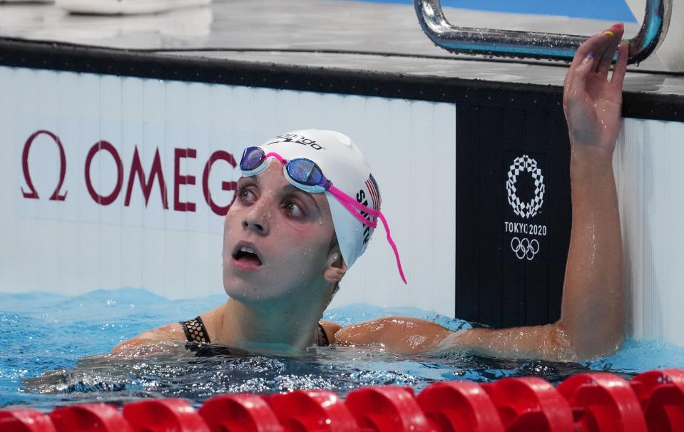 Regan Smith (USA) reacts after swimming in the women's 100m backstroke heats during the Tokyo 2020 Olympic Summer Games at Tokyo Aquatics Centre.