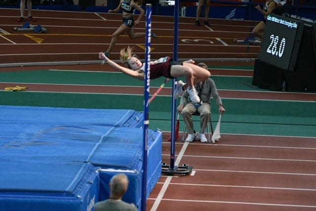 Joseph Case high jumper Hannah Santos clears the bar during a recent indoor competition.