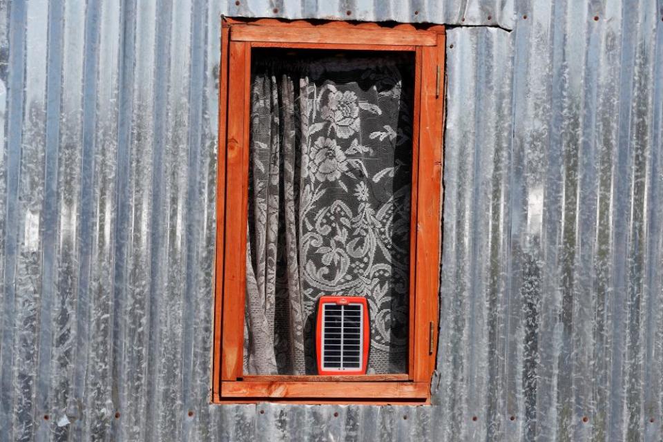 Colorful World: Fifty Shades of Silverepa08444319 A solar power charger in the window of a silver colored quonset hut built during a land invasion on the property of Louiesenhof Wine farm in the region of Stellenbosch, South Africa, 08 August 2018 (reissued 26 May 2020). Silver, also referred to as metallic grey, became a symbol for prosperity and wealth due to its usage for coins and jewellery. Not as dominant and showy as glittering gold, silver incorporates the qualities of strength, stability and status, especially in the world of business. In color psychology it is linked with serenity and reflection. Allocated in the middle of black and white, like grey, it is regarded as calm, balancing and stress-reducing. EPA/NIC BOTHMA ATTENTION: This Image is part of a PHOTO SET *** Local Caption *** 54538547