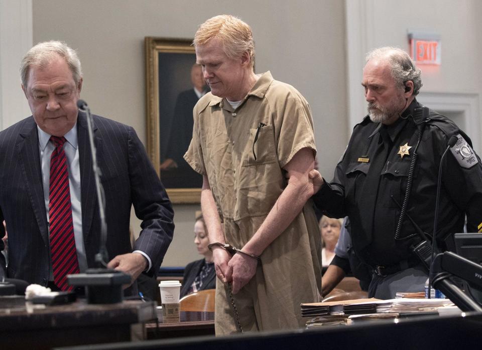 alex murdaugh is led out of a courthouse in handcuffs at his sentencing hearing on march 3