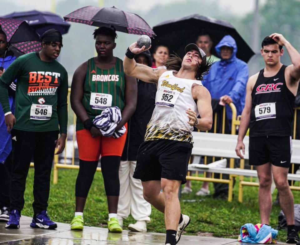 Woodford County’s Grant Garrison won the shot put and discus events Saturday to lead the Yellow Jackets to a region title. “He’s just a huge guy with a huge heart, and he stepped up when he needed to,” Coach Adam Swingle said of the senior.