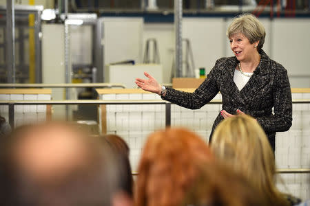 Britain's Prime Minister, Theresa May, addresses staff at GlaxoSmithKline toothpaste factory in Maidenhead, April 21, 2017. REUTERS/Leon Neal/Pool