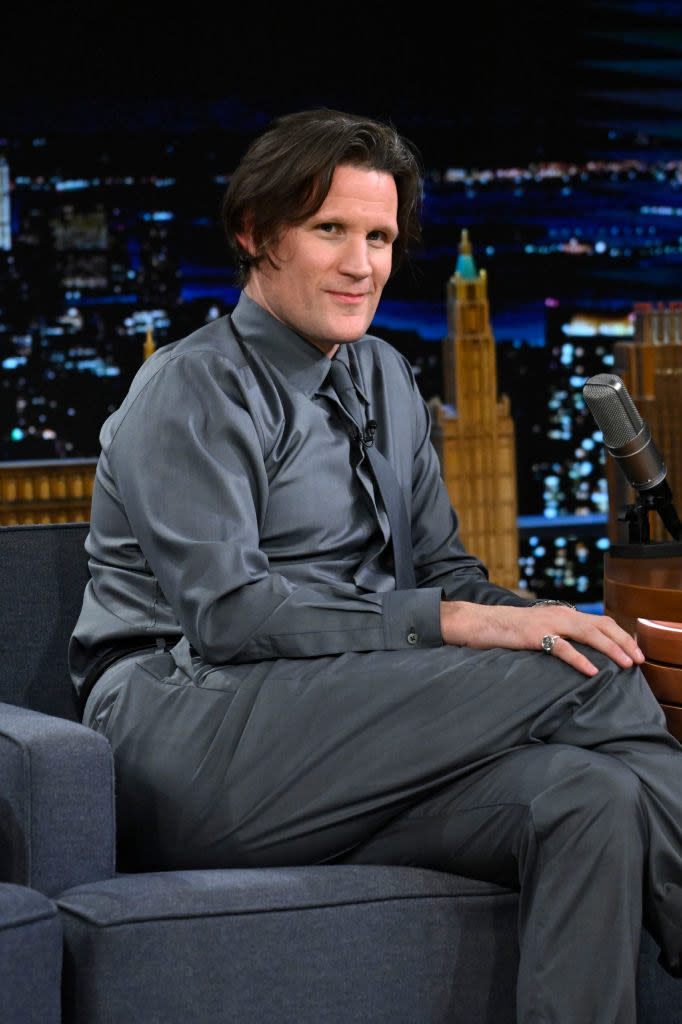 Matt Smith sits during a late-night TV interview