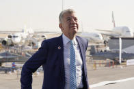 Paul Griffiths, the CEO of Dubai Airports, attends the Dubai Air Show in Dubai, United Arab Emirates, Monday, Nov. 15, 2021. Dubai International Airport, the world's busiest airport for international travel, handled some 20% more passenger traffic in the third quarter of 2021 compared to the same period last year, Griffiths said Monday, signaling cautious optimism for the ravaged aviation industry even as a full recovery may remain years off. (AP Photo/Jon Gambrell)