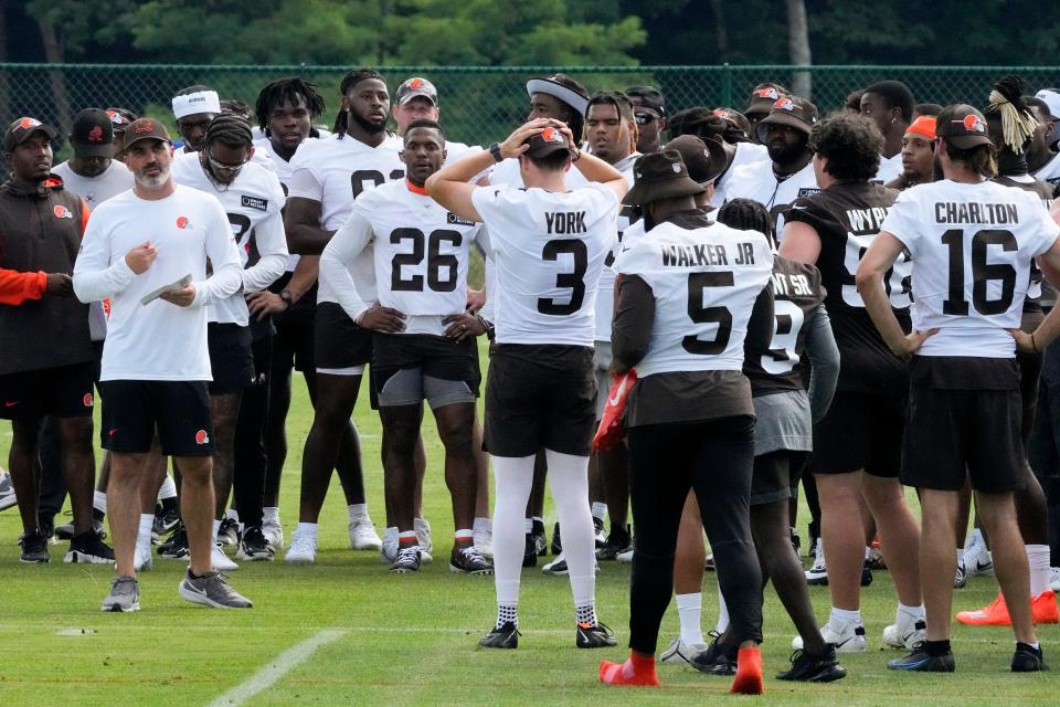 Cleveland Browns coach Kevin Stefanski, front left, gathers his team at their training camp facility July 22 in White Sulphur Springs, W.V.