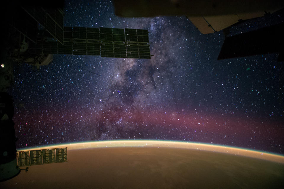 NASA astronaut Reid Wiseman captured this image from the International Space Station and tweeted it on Sept. 28, writing, "<a href="http://www.nasa.gov/content/milky-way-viewed-from-the-international-space-station/#.VI8eXCfwNBK" target="_blank">The Milky Way</a> steals the show from Sahara sands that make the Earth glow orange."