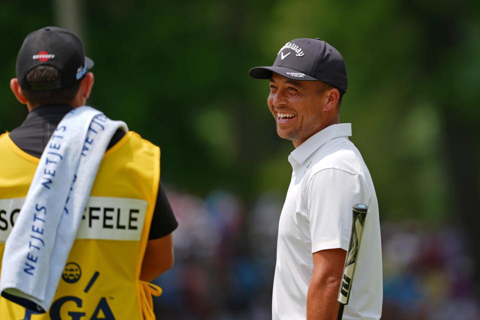 Xander Schauffele smiles on the eighth green during the first round of the PGA Championship.